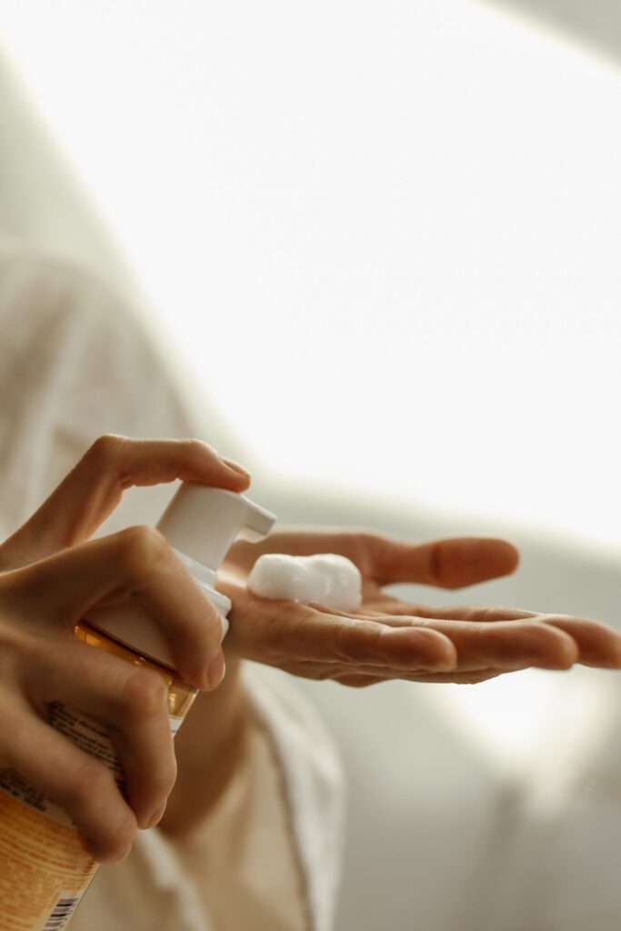 dispensing hair foam on hand