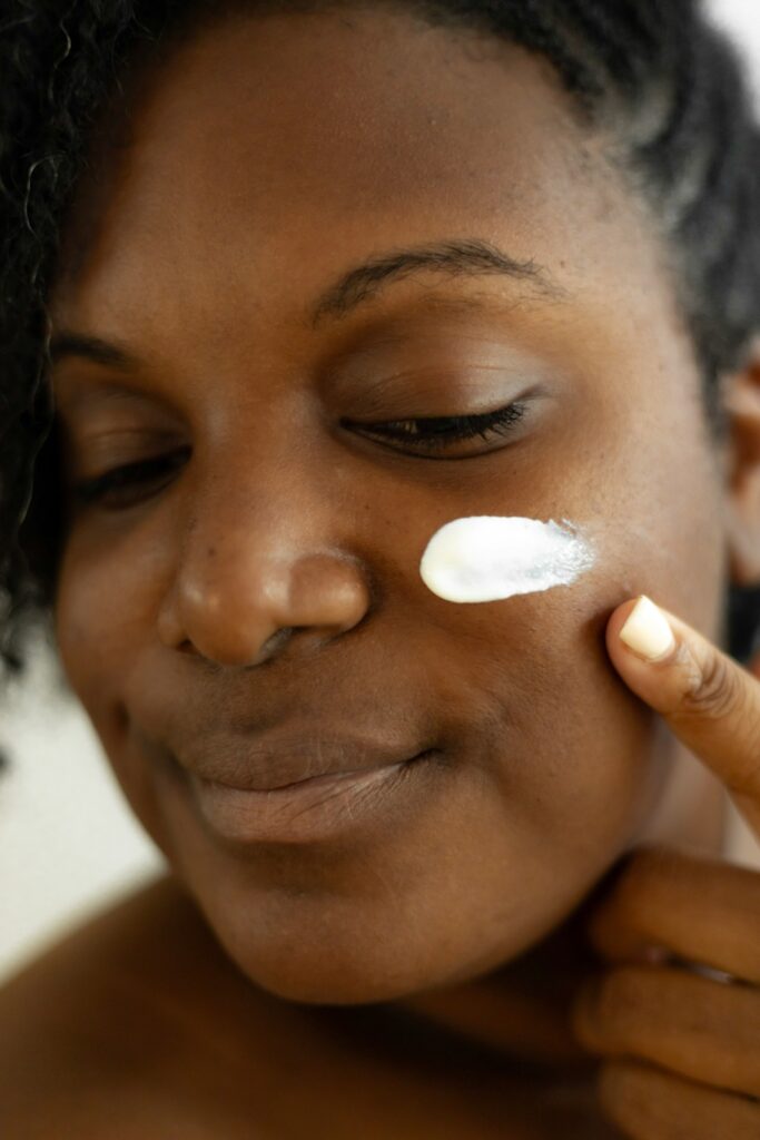 skin of color applying cream