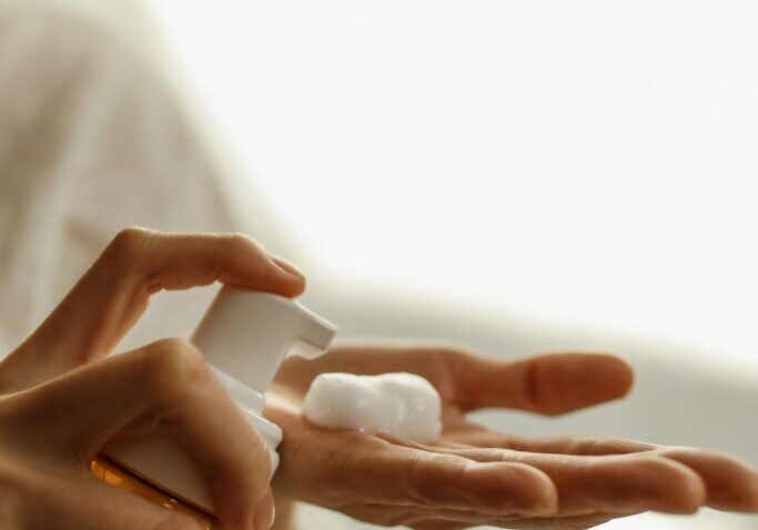 dispensing hair foam on hand