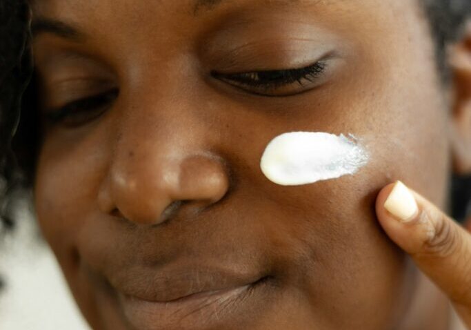 skin of color applying cream