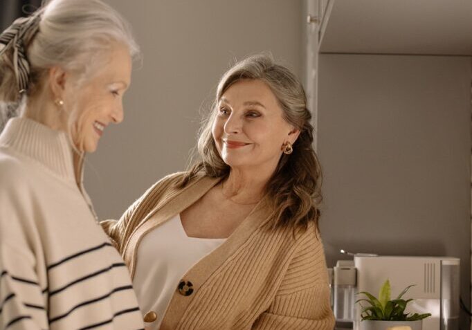 two-old-ladies-talking-happily
